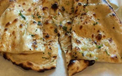 Indian bread called garlic naan at diamond palace